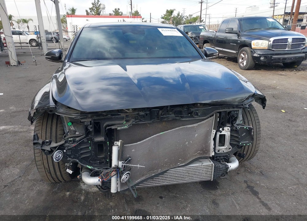 2023 GENESIS G70 2.0T RWD VIN: KMTG34TA4PU126609