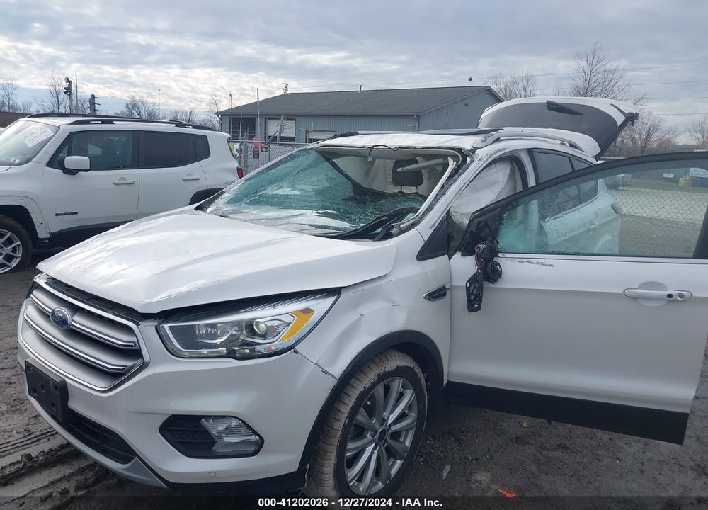 2017 FORD ESCAPE TITANIUM VIN: 1FMCU0JD9HUA12764