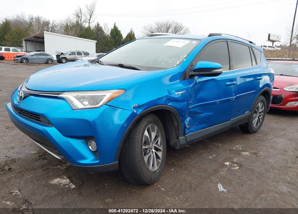 2016 TOYOTA RAV4 HYBRID XLE VIN: JTMRJREV7GD025610