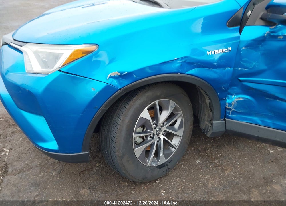 2016 TOYOTA RAV4 HYBRID XLE VIN: JTMRJREV7GD025610