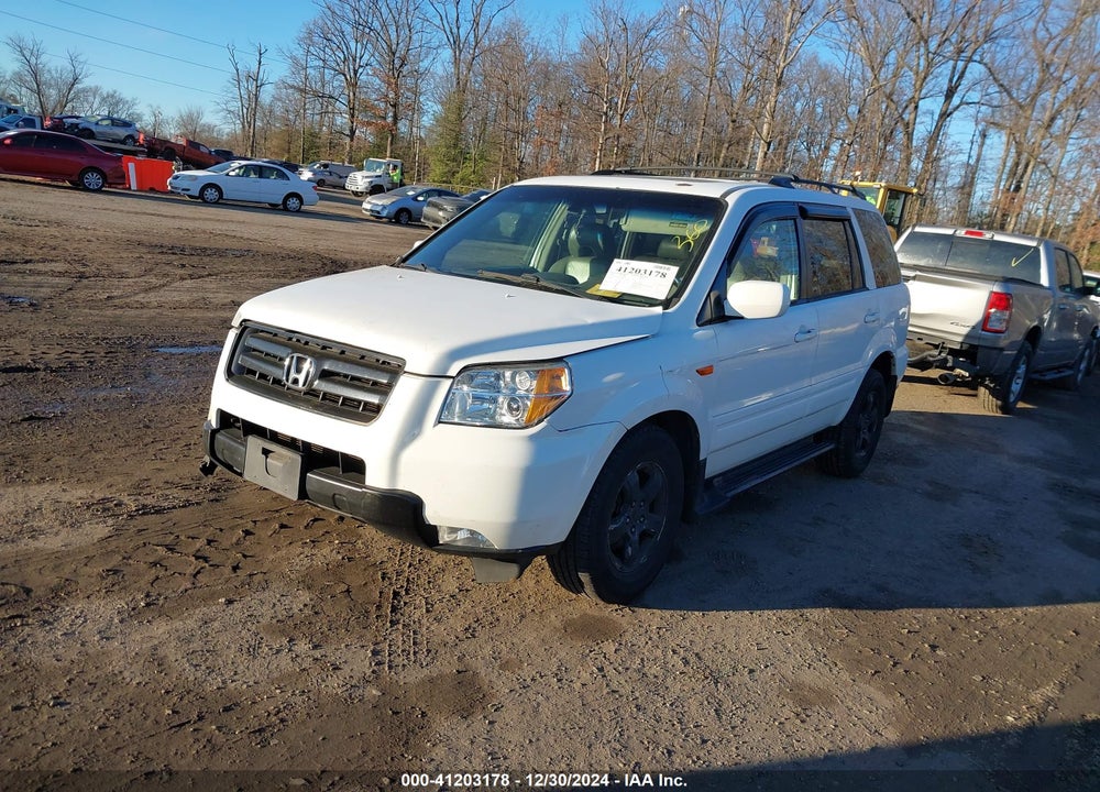 2006 HONDA PILOT EX-L VIN: 2HKYF18556H559191