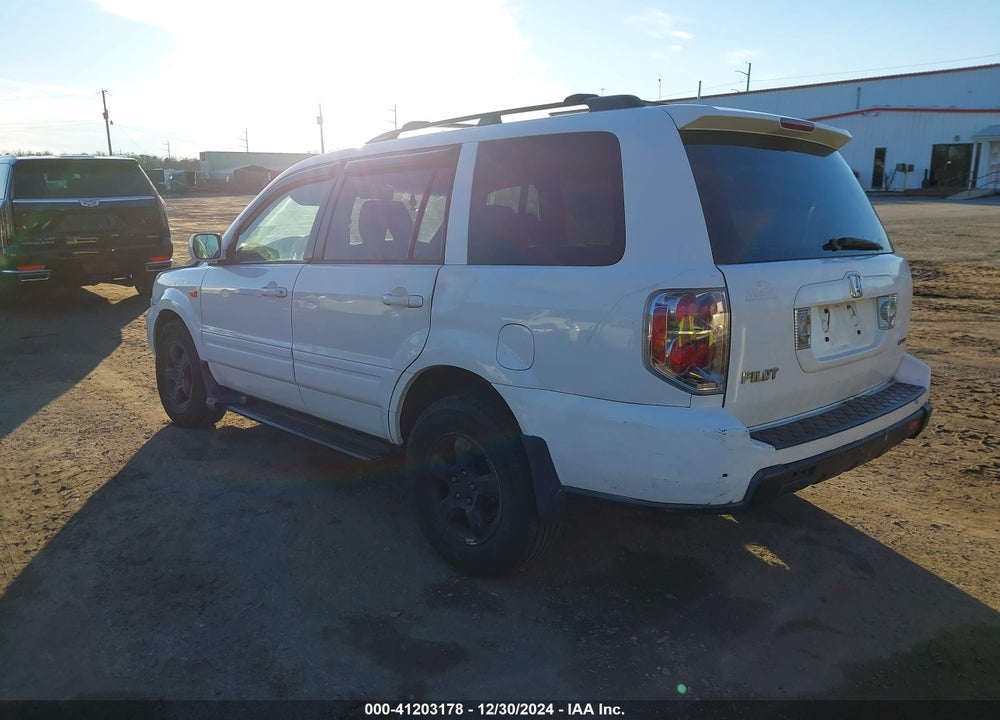 2006 HONDA PILOT EX-L VIN: 2HKYF18556H559191
