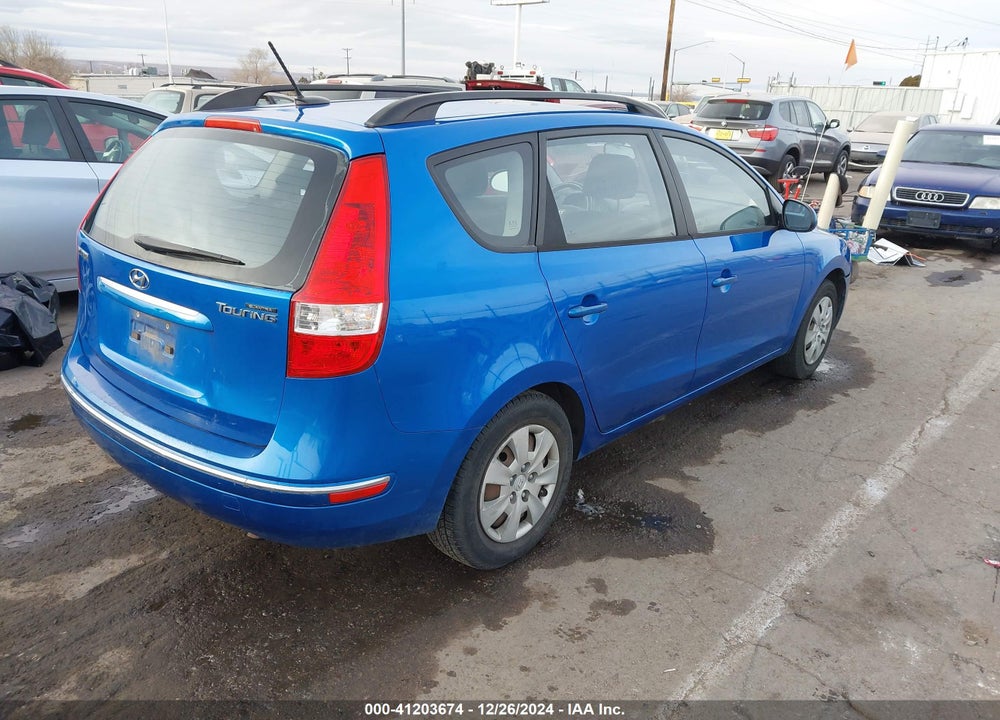 2010 HYUNDAI ELANTRA TOURING GLS VIN: KMHDC8AEXAU076073