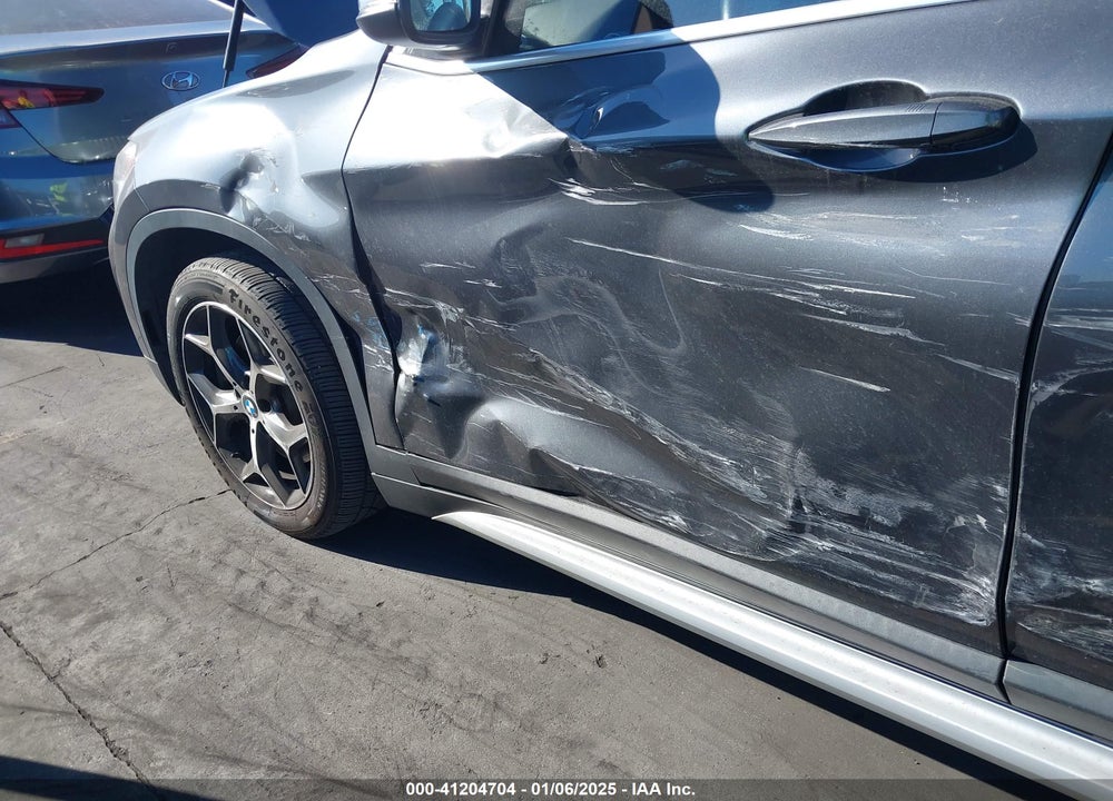 2019 BMW X1 VIN: WBXHU7C56K3H46077