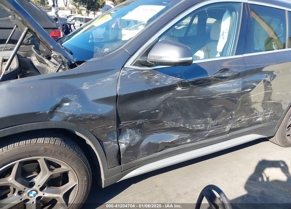 2019 BMW X1 VIN: WBXHU7C56K3H46077