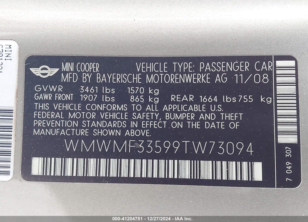 2009 MINI COOPER VIN: WMWMF33599TW73094