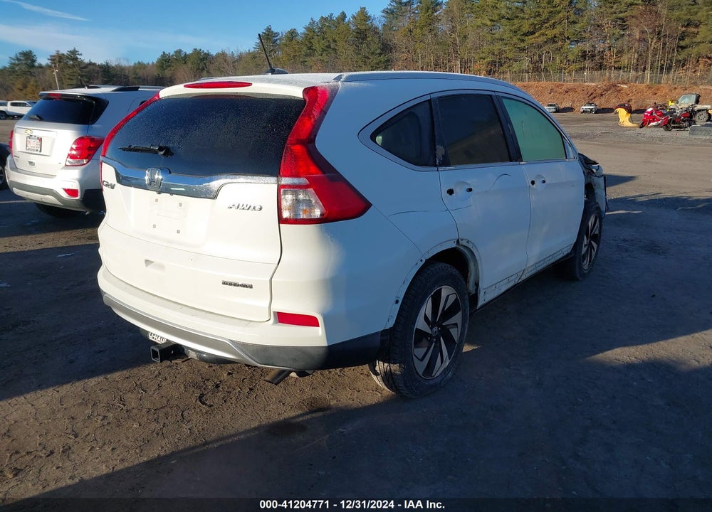2016 HONDA CR-V TOURING VIN: 5J6RM4H94GL010488