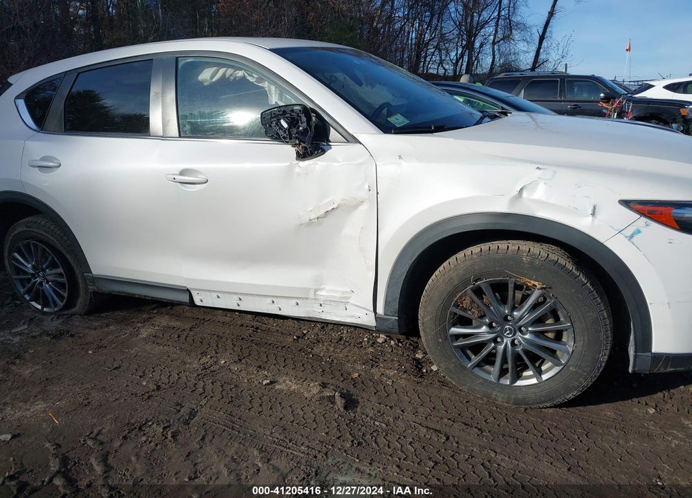 2021 MAZDA CX-5 TOURING VIN: JM3KFBCM4M1389234