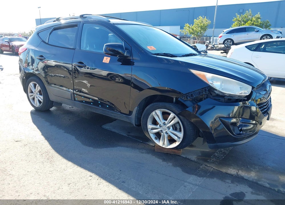 2011 HYUNDAI TUCSON VIN: KM8JUCAC8BU239743