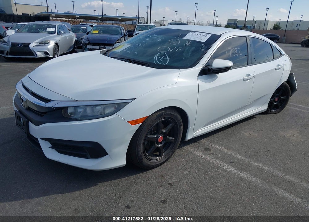 2018 HONDA CIVIC LX VIN: 2HGFC2F54JH604309