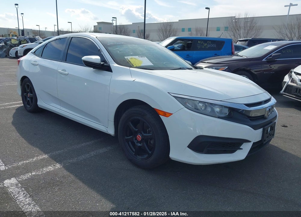 2018 HONDA CIVIC LX VIN: 2HGFC2F54JH604309