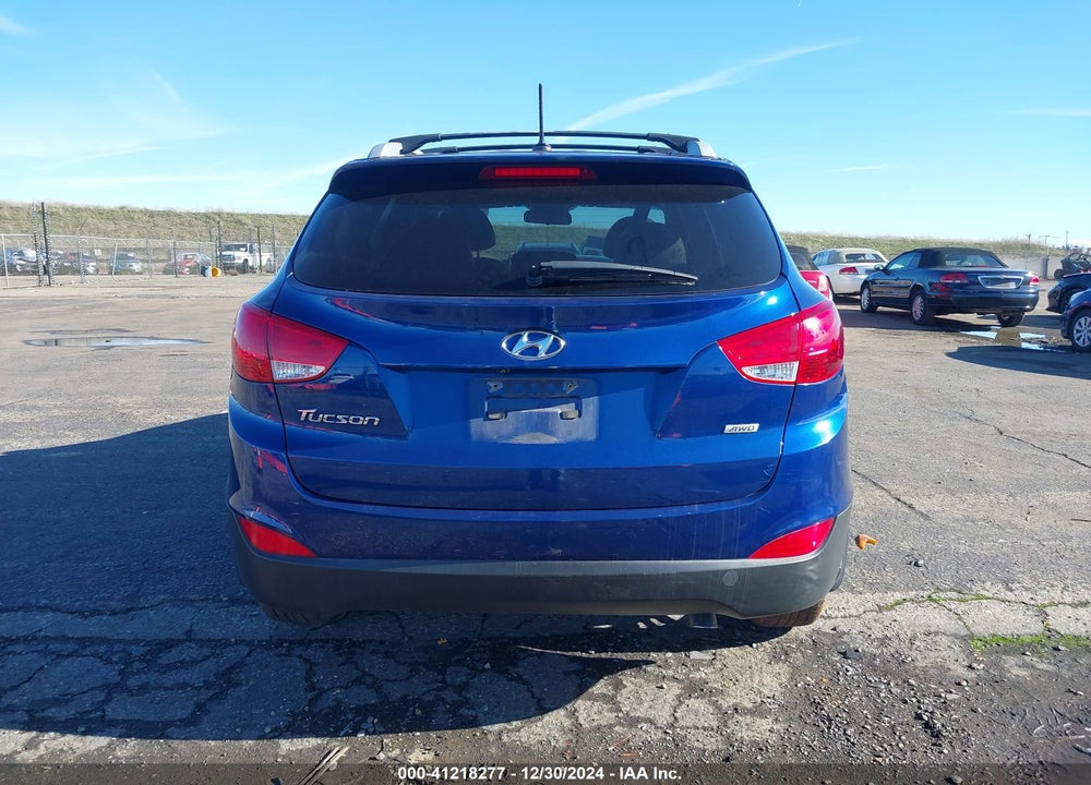 2014 HYUNDAI TUCSON SE VIN: KM8JUCAG2EU897498