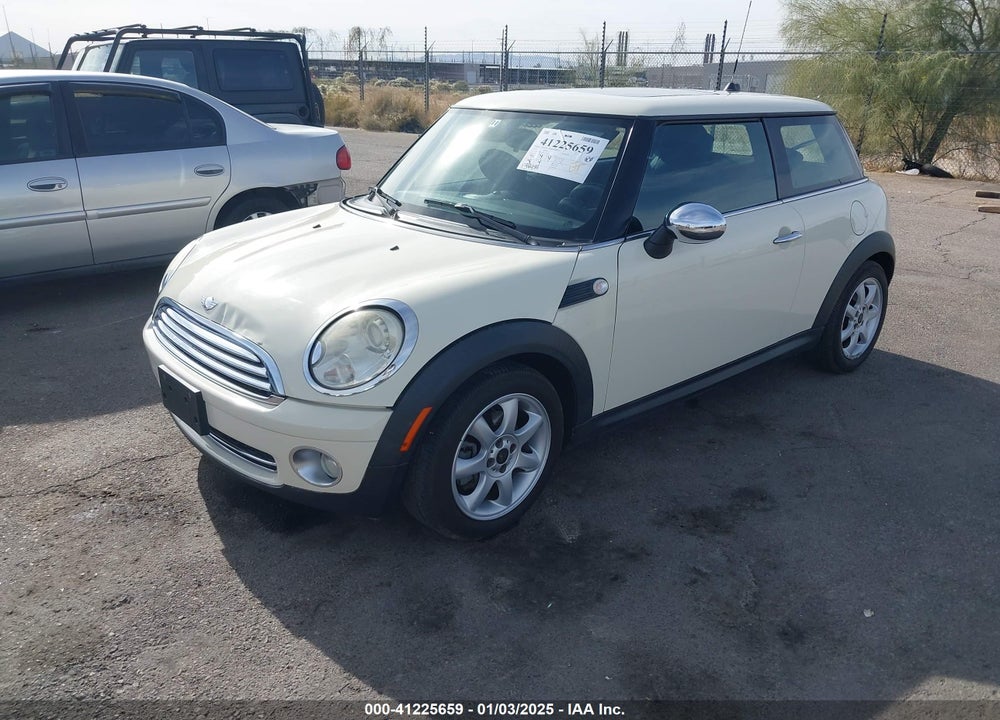 2007 MINI COOPER VIN: WMWMF33527TT53306
