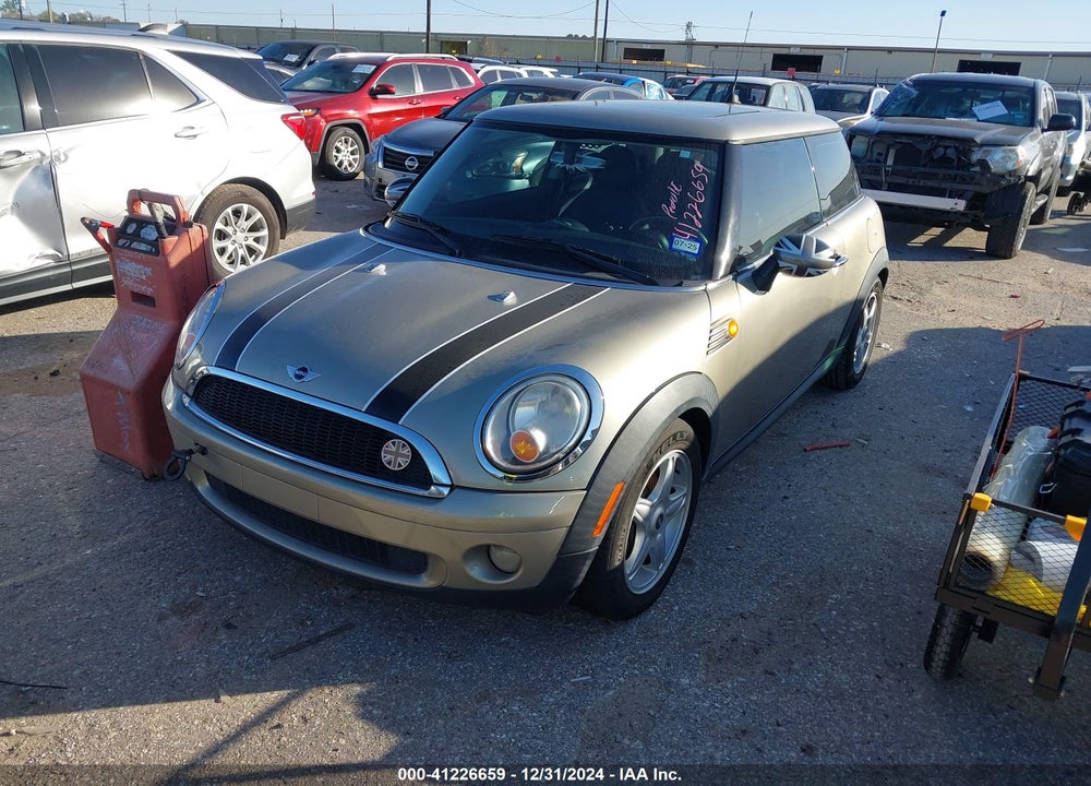 2007 MINI COOPER VIN: WMWMF33527TT52141