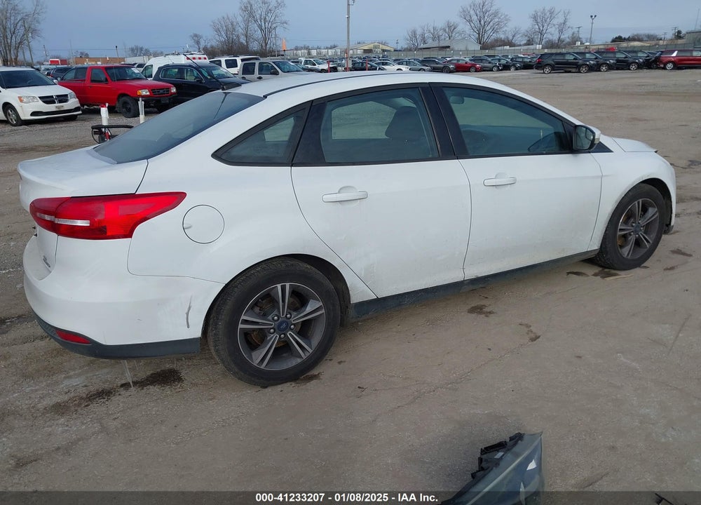 2016 FORD FOCUS VIN: 1FADP3FE9GL371660