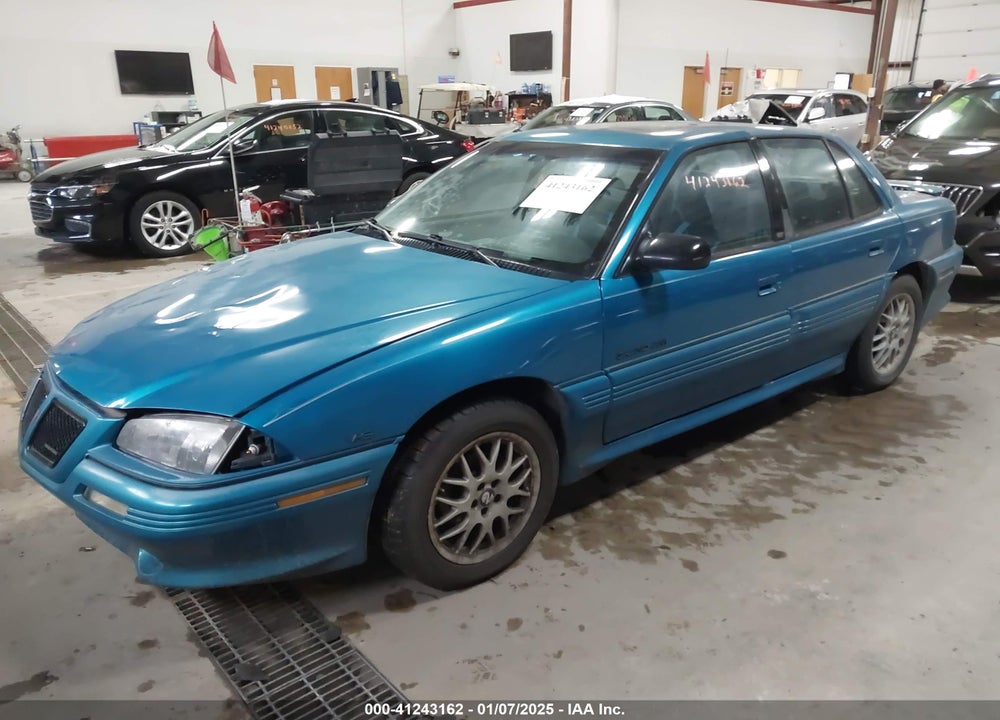 1995 PONTIAC GRAND AM GT VIN: 1G2NW55M0SC757077