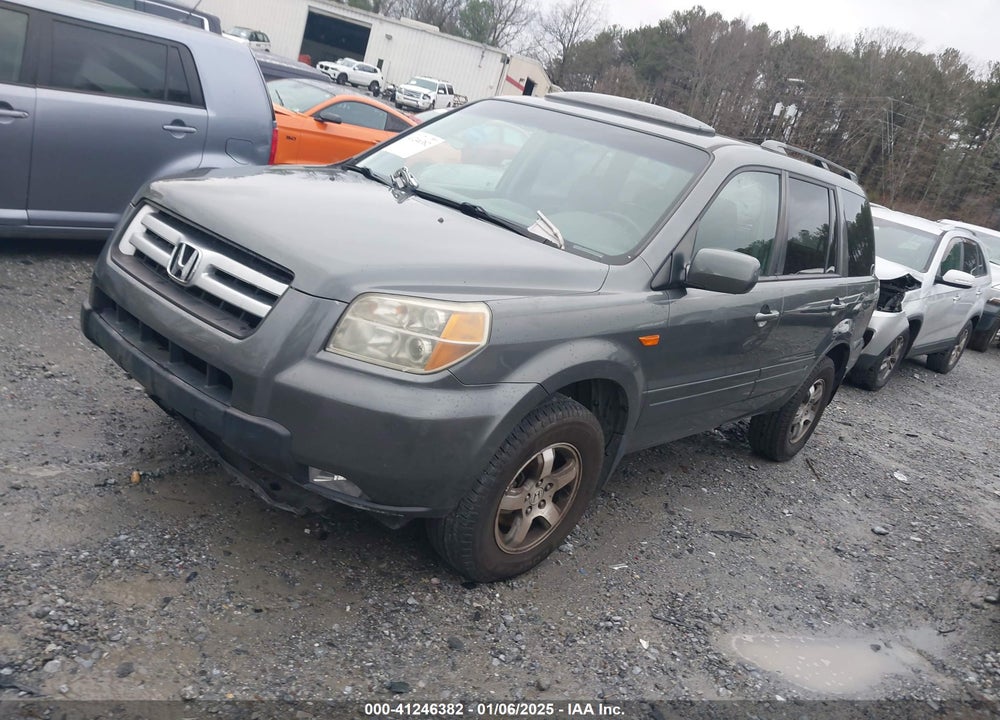 2007 HONDA PILOT EX-L VIN: 5FNYF28777B002807