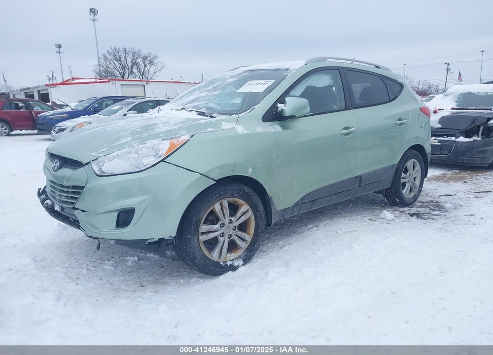 2011 HYUNDAI TUCSON GLS/LIMITED VIN: KM8JU3ACXBU127896