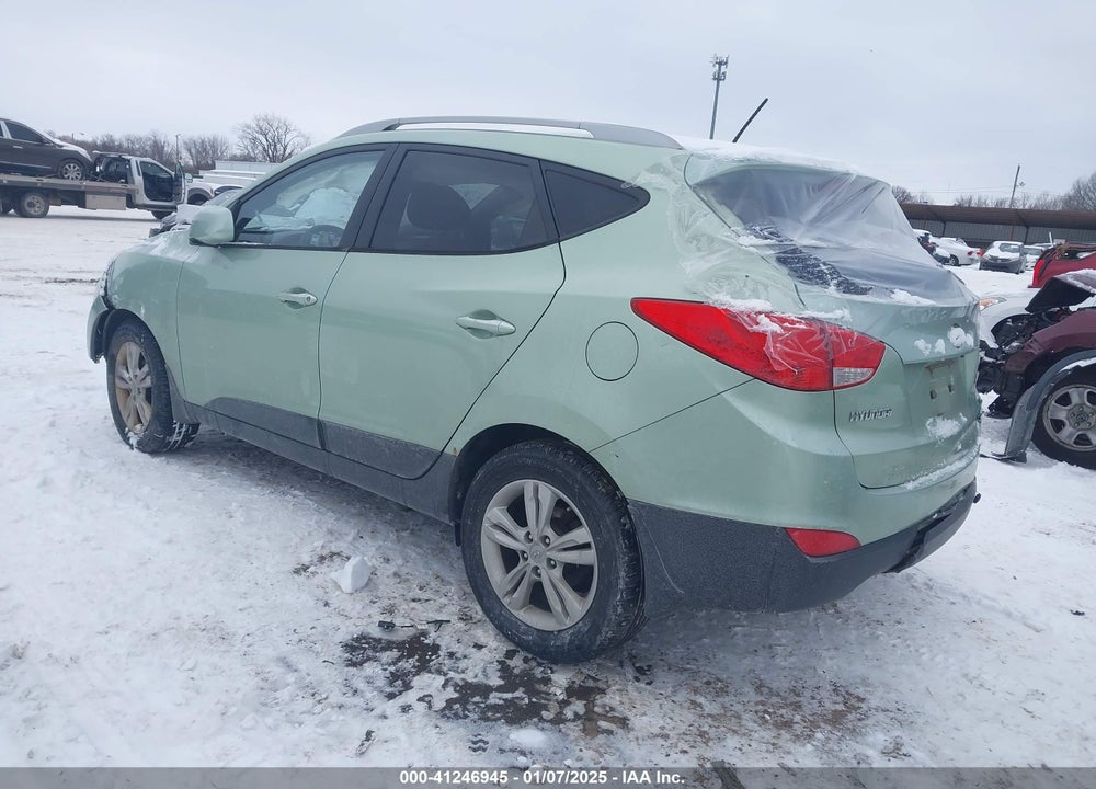 2011 HYUNDAI TUCSON GLS/LIMITED VIN: KM8JU3ACXBU127896