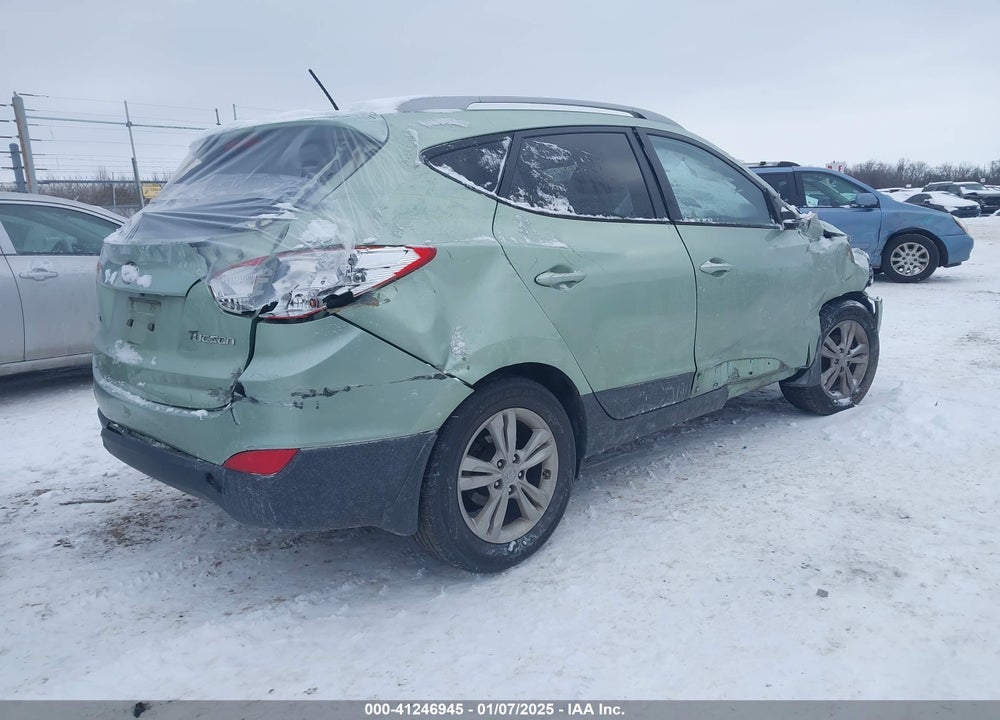2011 HYUNDAI TUCSON GLS/LIMITED VIN: KM8JU3ACXBU127896