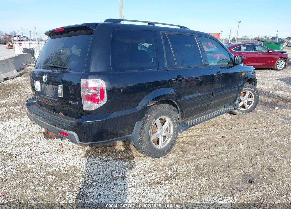 2006 HONDA PILOT EX-L VIN: 5FNYF18586B017405