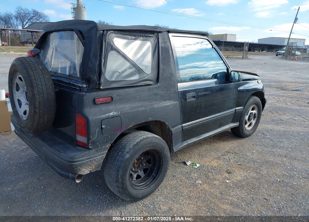 1995 GEO TRACKER VIN: 2CNBE18UXS6954557