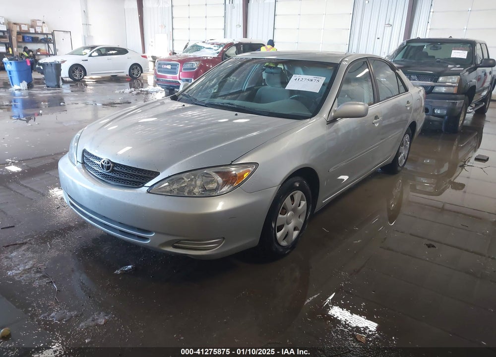 2004 TOYOTA CAMRY LE VIN: JTDBE32K940302029