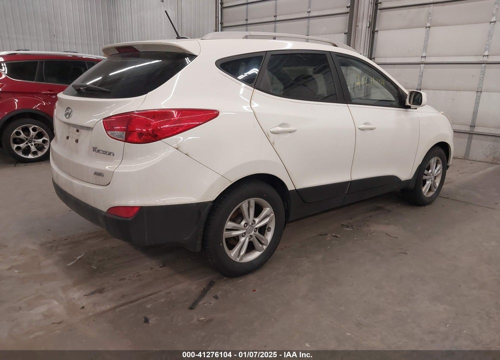 2010 HYUNDAI TUCSON GLS VIN: KM8JUCAC2AU056739