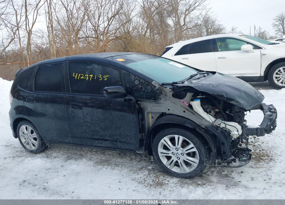 2009 HONDA FIT VIN: JHMGE88409C002735