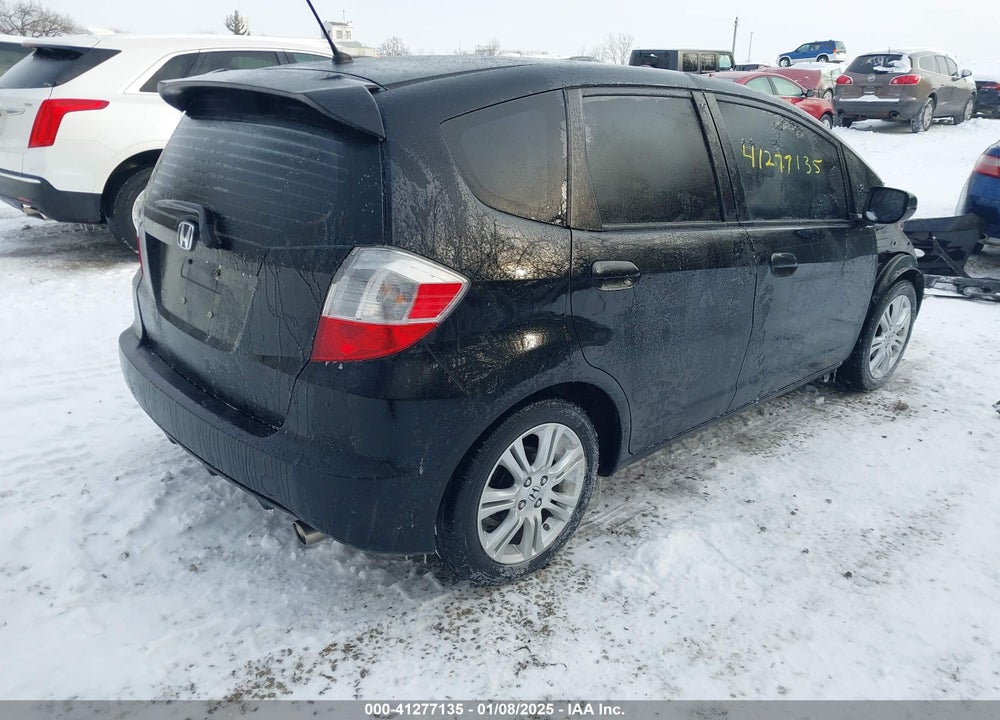 2009 HONDA FIT VIN: JHMGE88409C002735