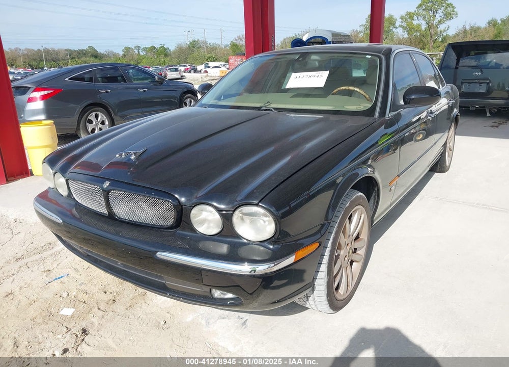 2004 JAGUAR XJ XJR VIN: SAJEA73B74TG12049