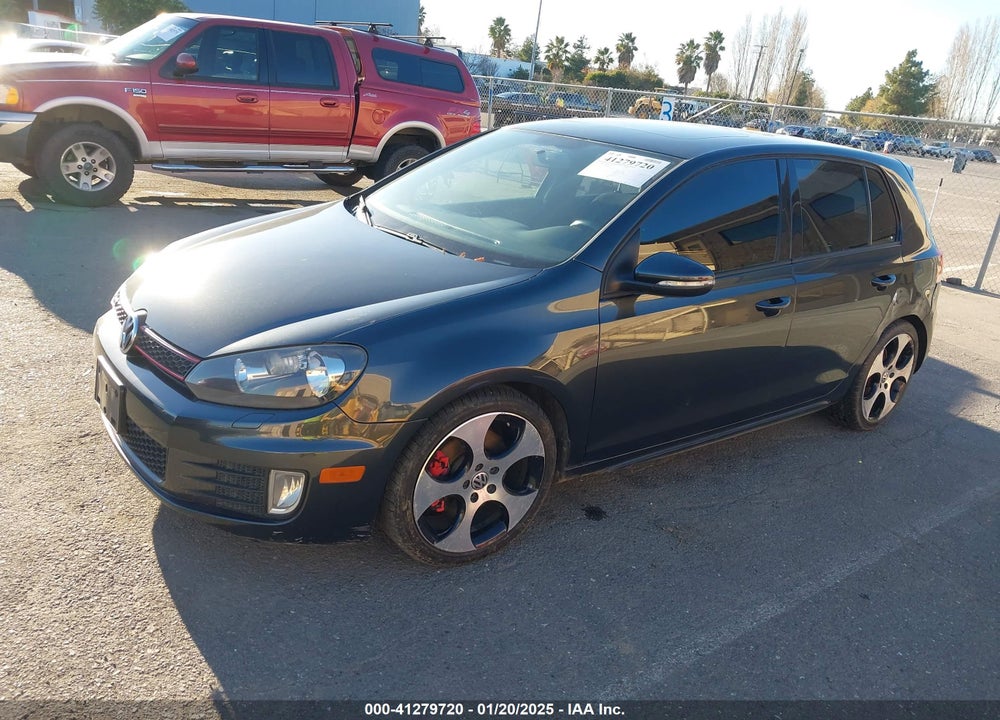 2011 VOLKSWAGEN GTI 4-DOOR VIN: WVWHD7AJXBW340215