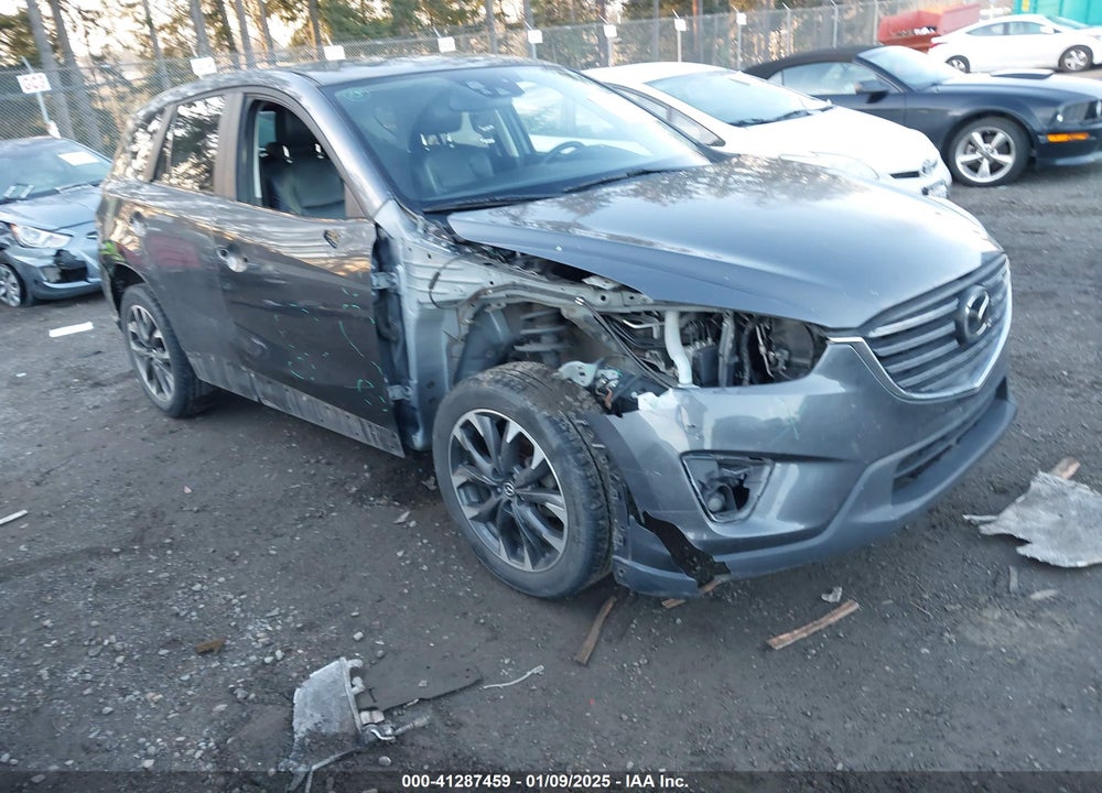 2016 MAZDA CX-5 GRAND TOURING VIN: JM3KE4DY3G0817899