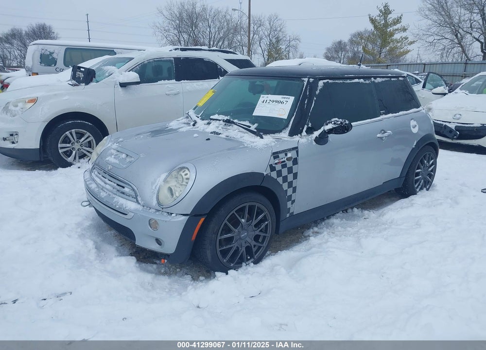 2006 MINI COOPER S VIN: WMWRE33586TL23444