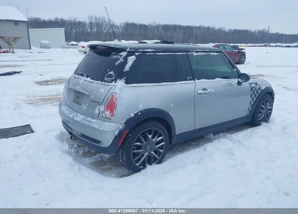 2006 MINI COOPER S VIN: WMWRE33586TL23444
