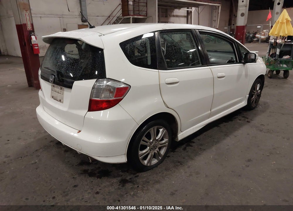2009 HONDA FIT SPORT VIN: JHMGE88499S073017
