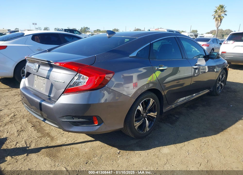 2017 HONDA CIVIC TOURING VIN: 2HGFC1F96HH644463