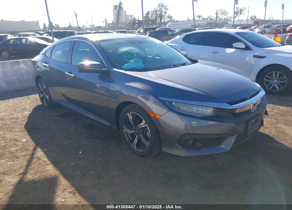 2017 HONDA CIVIC TOURING VIN: 2HGFC1F96HH644463