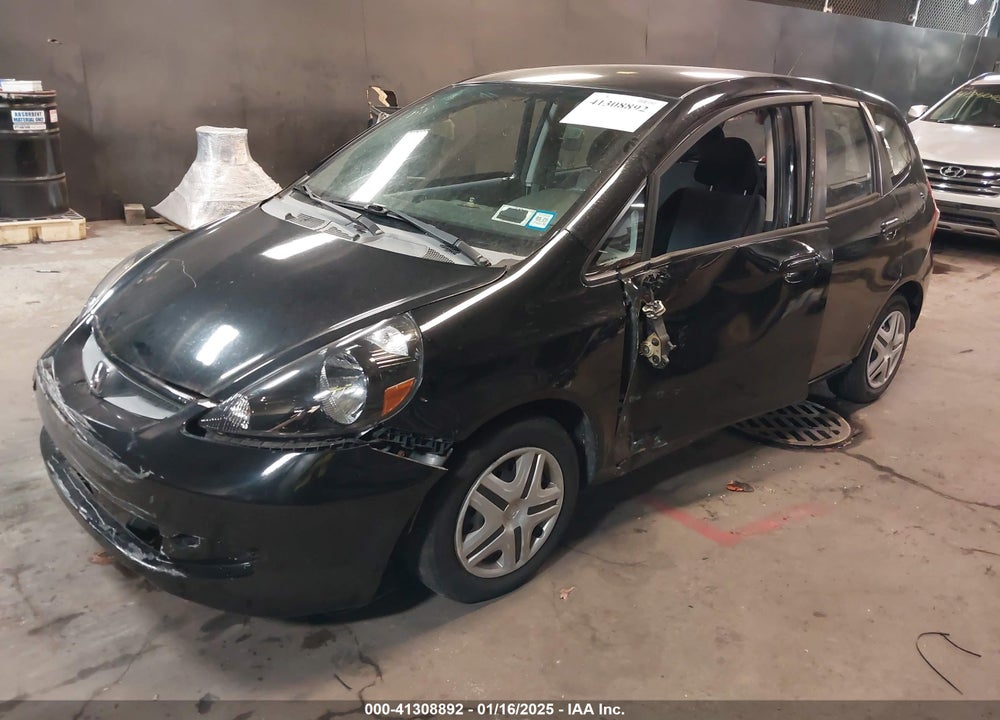 2007 HONDA FIT VIN: JHMGD38457S040194