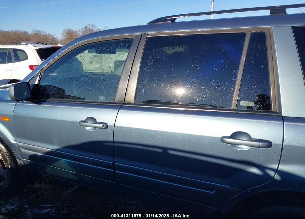 2007 HONDA PILOT EX-L VIN: 5FNYF28677B028623