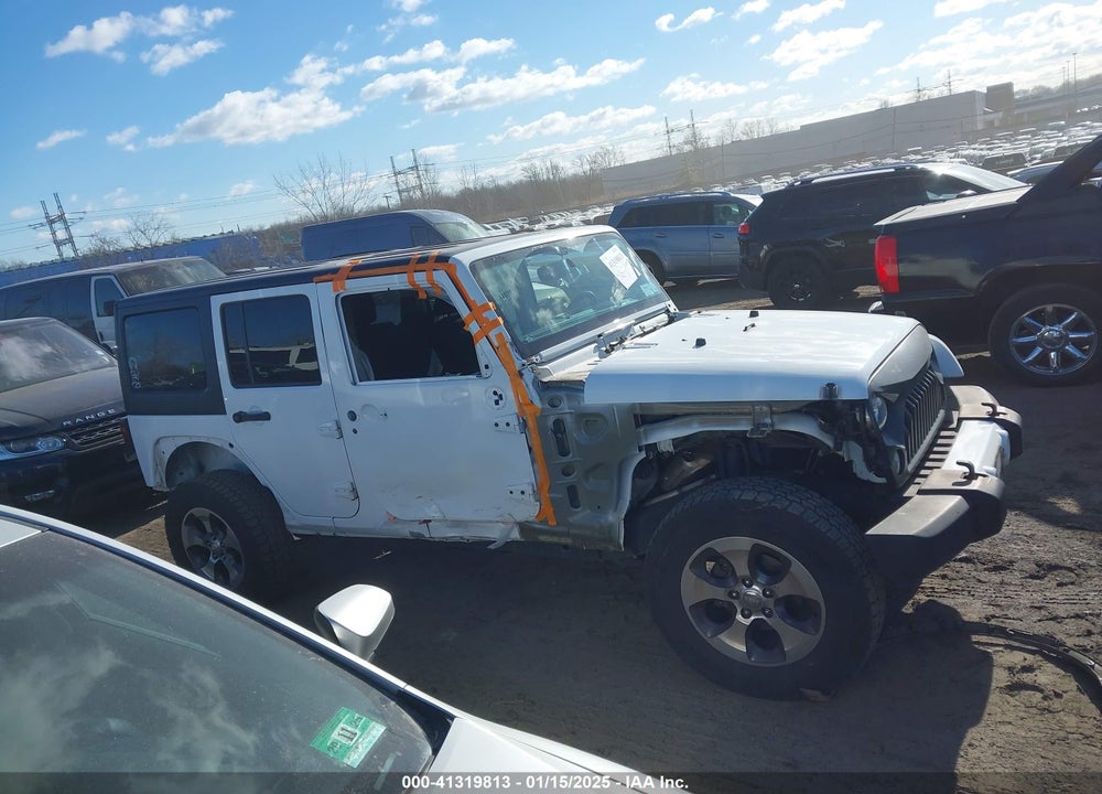 2016 JEEP WRANGLER UNLIMITED SAHARA VIN: 1C4HJWEG6GL138191