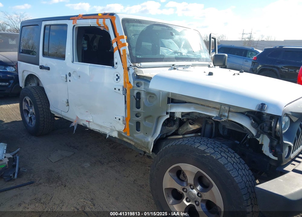 2016 JEEP WRANGLER UNLIMITED SAHARA VIN: 1C4HJWEG6GL138191