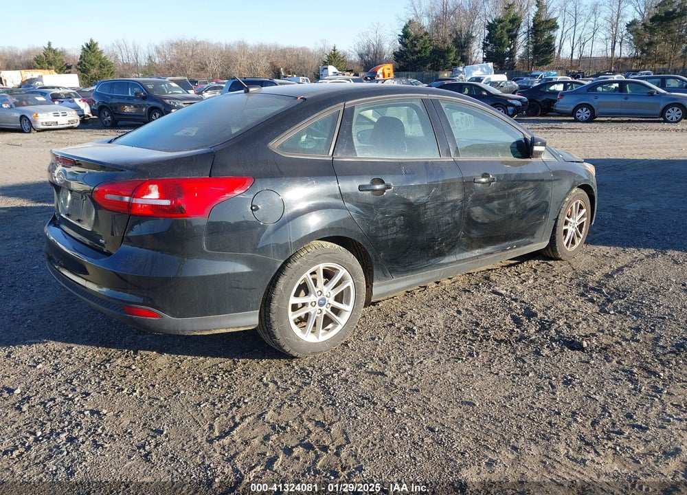 2016 FORD FOCUS VIN: 1FADP3F27GL385112