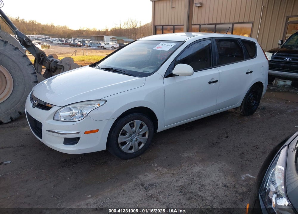 2010 HYUNDAI ELANTRA TOURING VIN: KMHDB8AE4AU059188