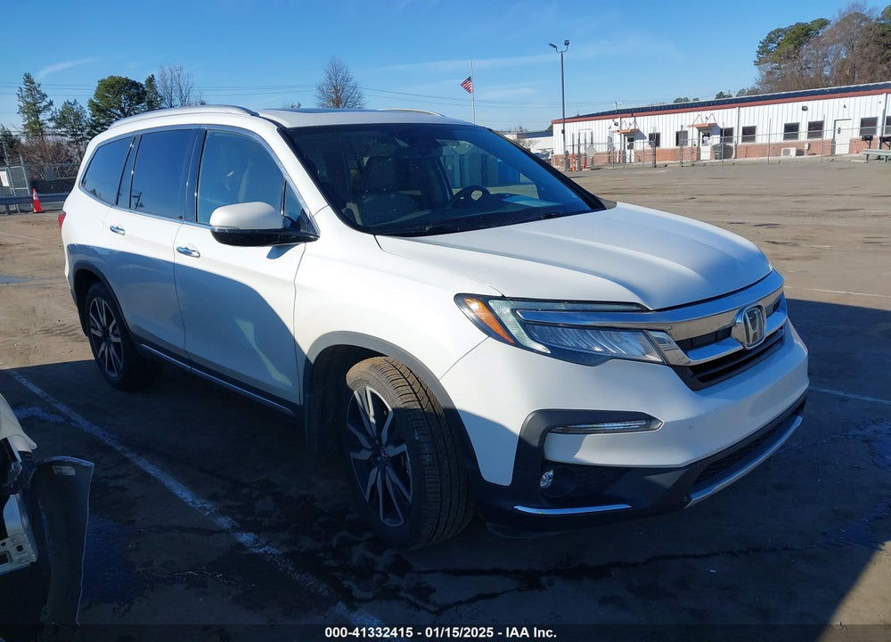 2021 HONDA PILOT 2WD TOURING 7 PASSENGER VIN: 5FNYF5H64MB031671