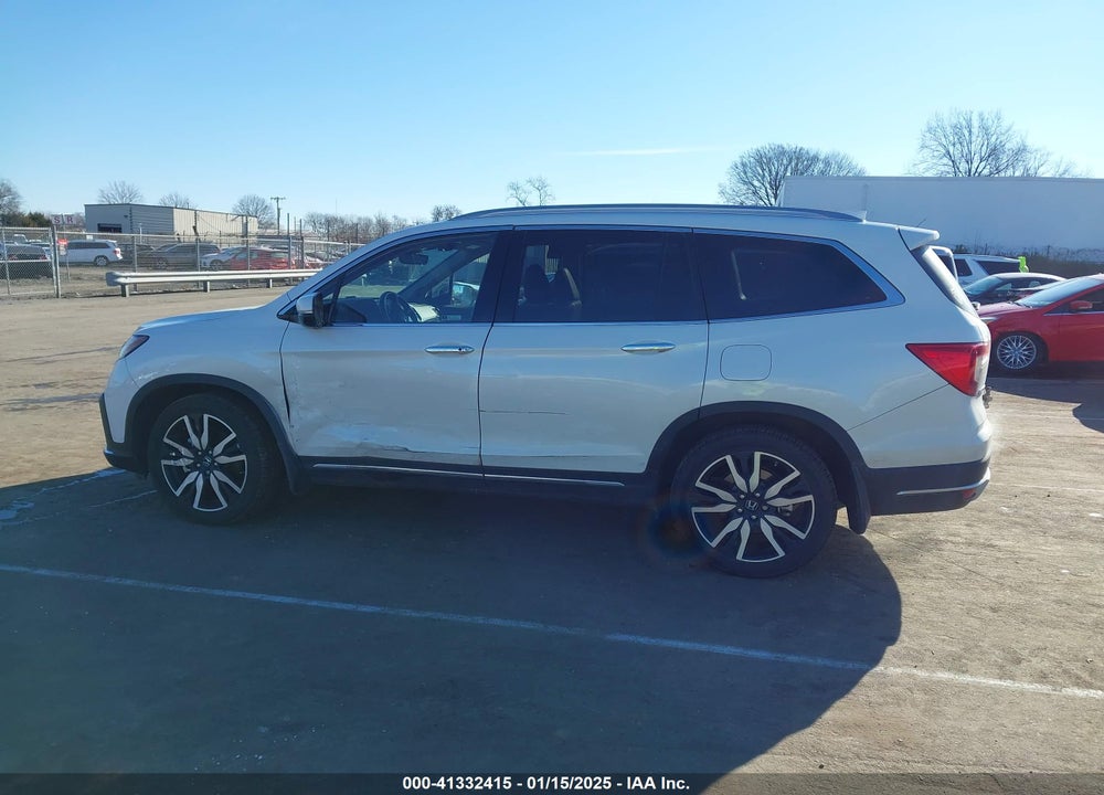 2021 HONDA PILOT 2WD TOURING 7 PASSENGER VIN: 5FNYF5H64MB031671