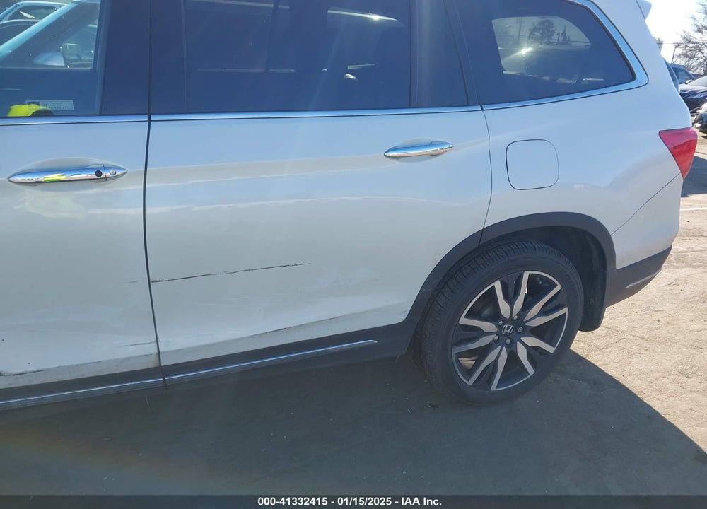 2021 HONDA PILOT 2WD TOURING 7 PASSENGER VIN: 5FNYF5H64MB031671