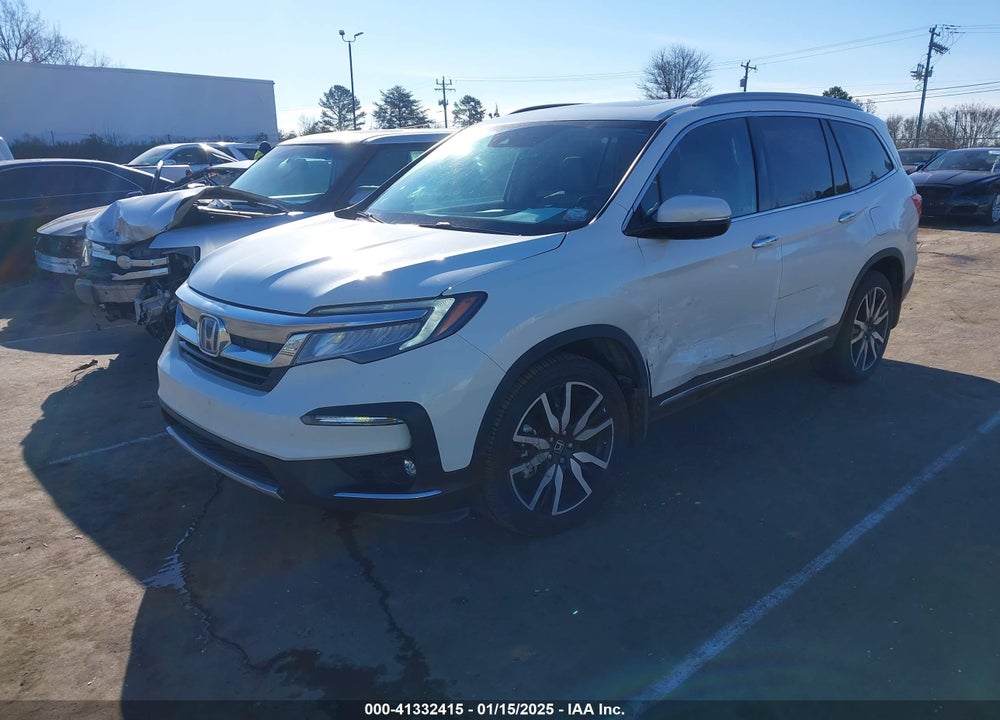 2021 HONDA PILOT 2WD TOURING 7 PASSENGER VIN: 5FNYF5H64MB031671