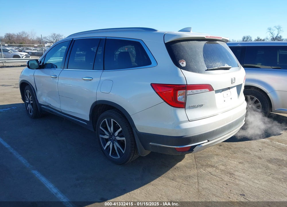 2021 HONDA PILOT 2WD TOURING 7 PASSENGER VIN: 5FNYF5H64MB031671