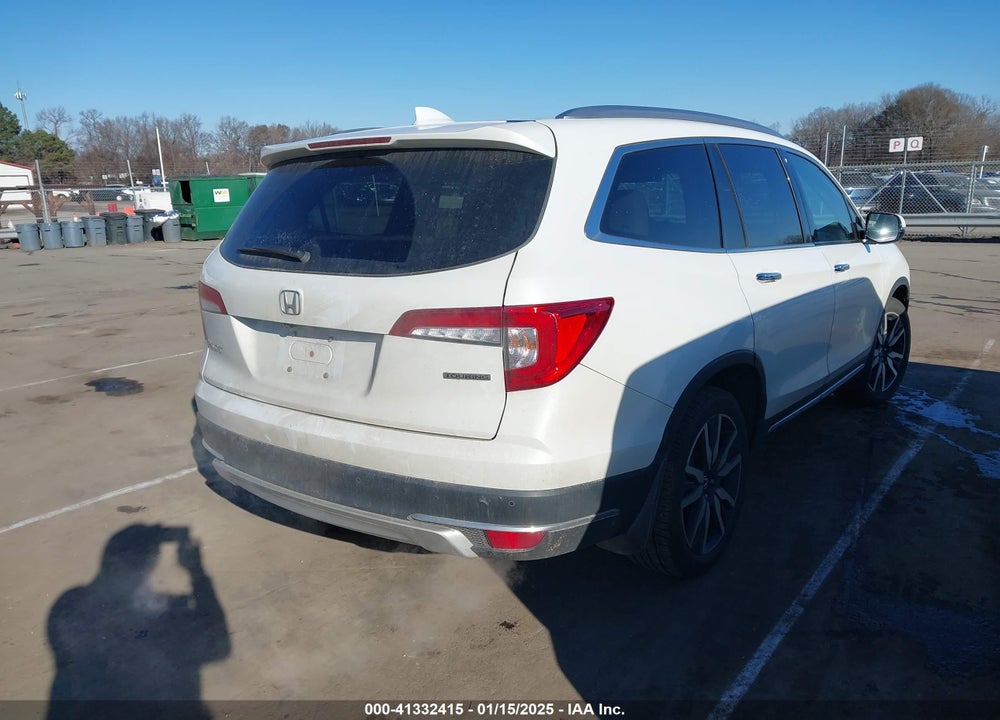 2021 HONDA PILOT 2WD TOURING 7 PASSENGER VIN: 5FNYF5H64MB031671